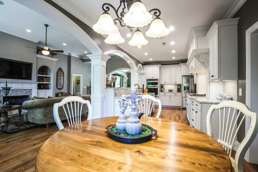 5939 Greenbriar Road Franklin, TN 37064 - Photo 10 of 30 a large kitchen with a table and chairs
