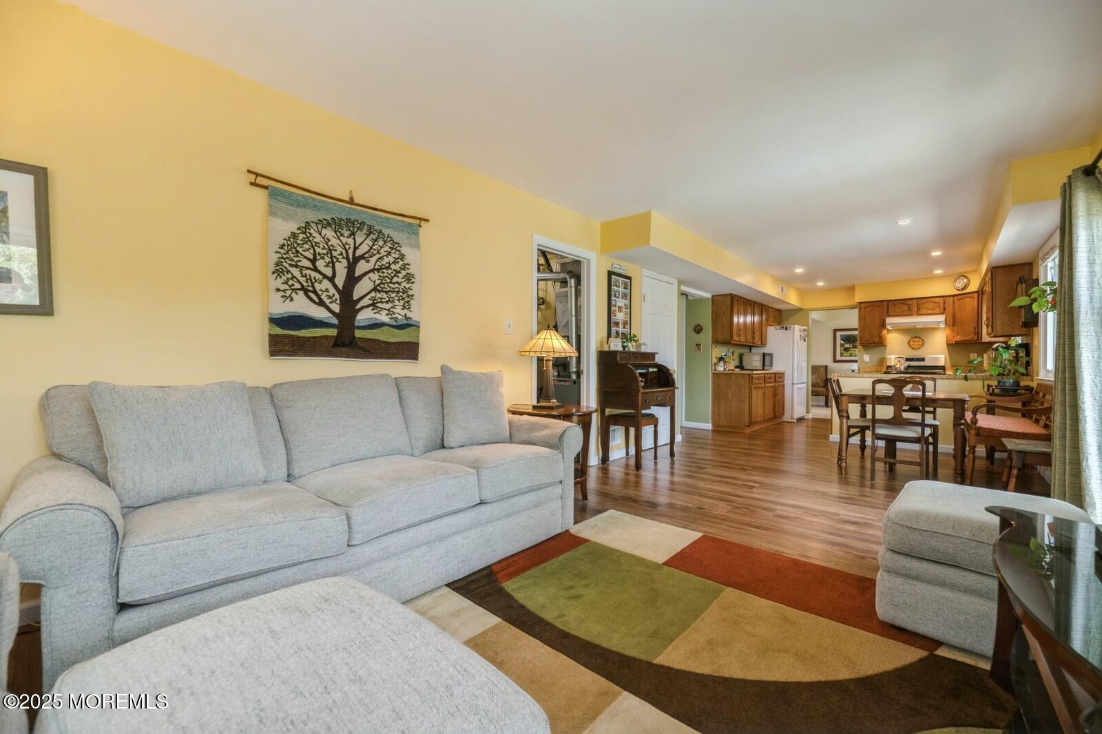 60 Appletree Road Howell, NJ 07731 - Photo 12 of 28 a living room with furniture and wooden floor