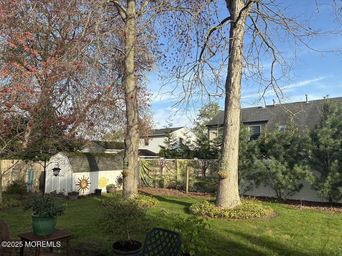 60 Appletree Road Howell, NJ 07731 - Photo 22 of 28 a view of back yard of the house