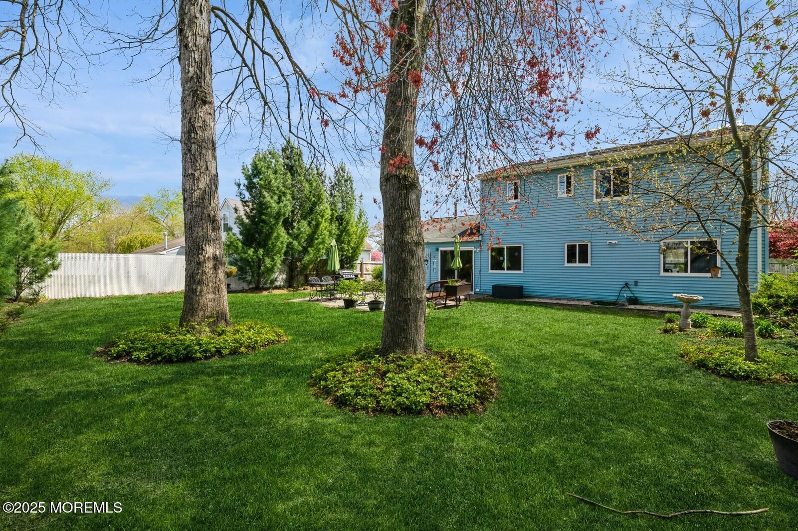 60 Appletree Road Howell, NJ 07731 - Photo 25 of 28 a view of a back yard