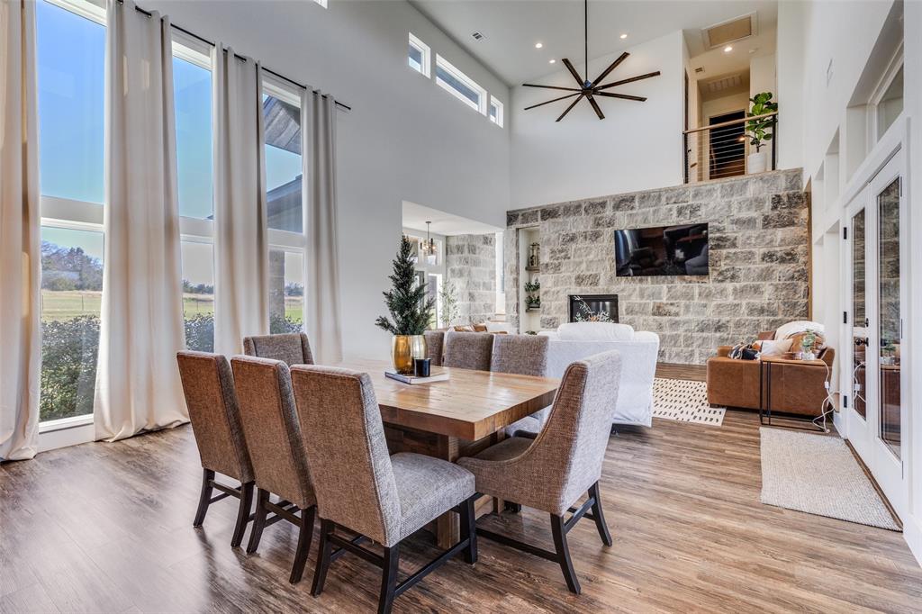 2687 North Trinity Street Decatur, TX 76234 - Photo 15 of 33 a view of a dining room with furniture window and wooden floor
