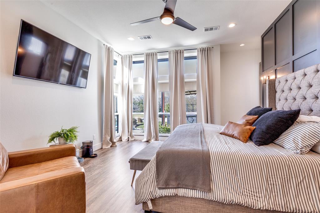 2687 North Trinity Street Decatur, TX 76234 - Photo 16 of 33 a bedroom with a balcony a bed and couch