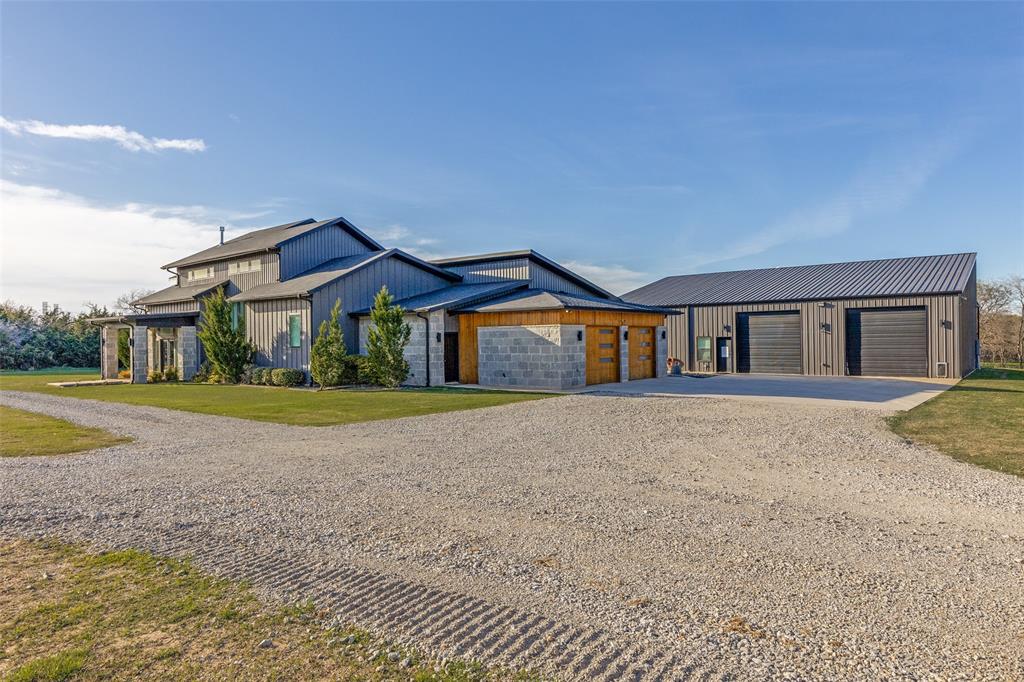 2687 North Trinity Street Decatur, TX 76234 - Photo 2 of 33 a house with yard in front of it