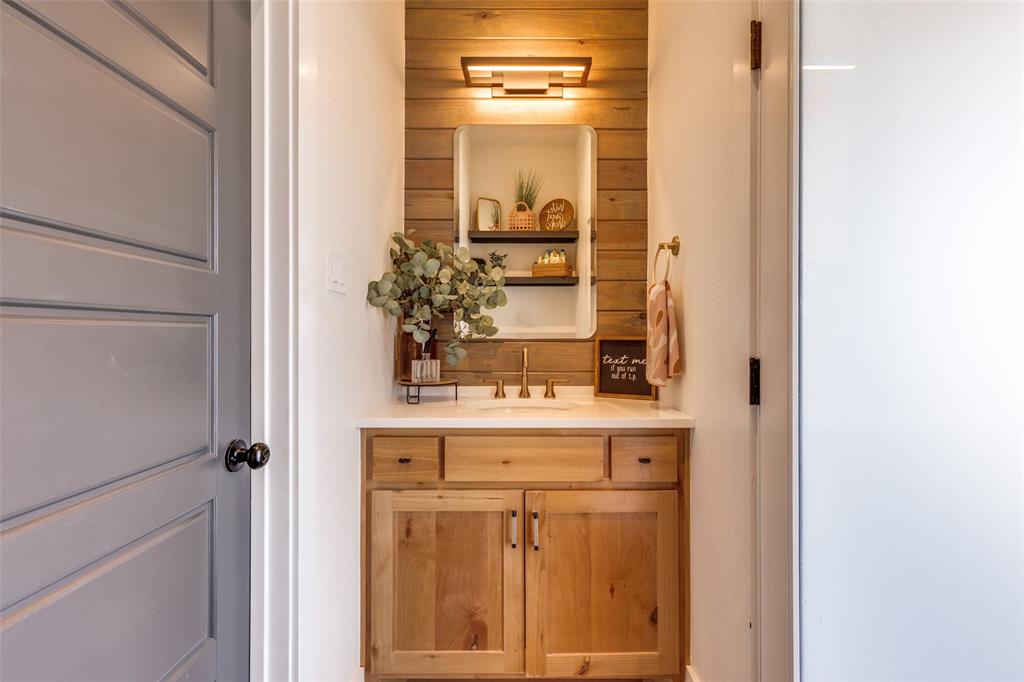 2687 North Trinity Street Decatur, TX 76234 - Photo 23 of 33 a view of a hallway with wooden door