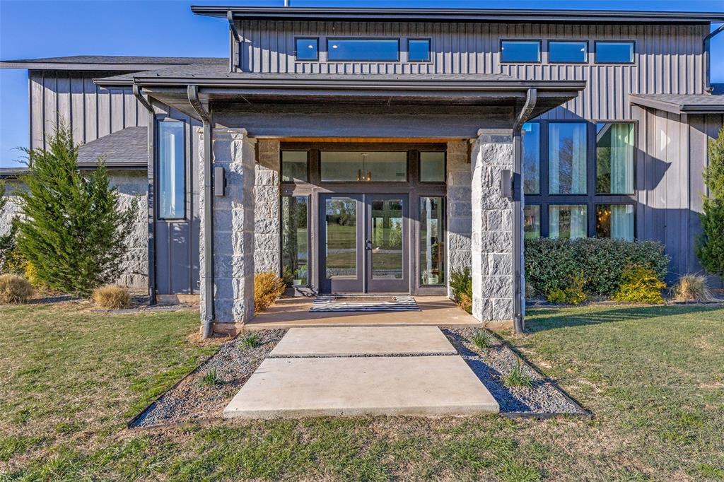 2687 North Trinity Street Decatur, TX 76234 - Photo 3 of 33 a view of a entrance door of the house