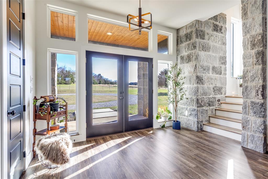 2687 North Trinity Street Decatur, TX 76234 - Photo 4 of 33 a view of a entryway with wooden floor