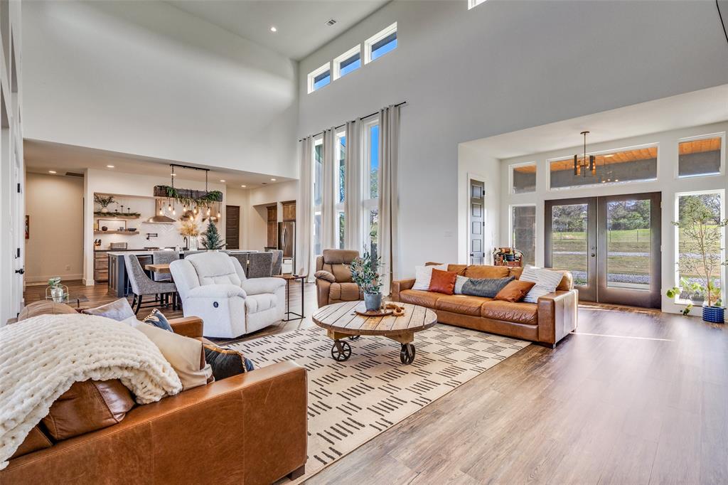 2687 North Trinity Street Decatur, TX 76234 - Photo 5 of 33 a living room with furniture and a large window