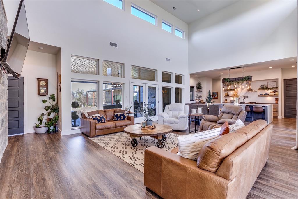 2687 North Trinity Street Decatur, TX 76234 - Photo 7 of 33 a living room with fireplace furniture and a wooden floor