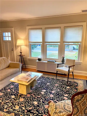 a living room with a couch and a table