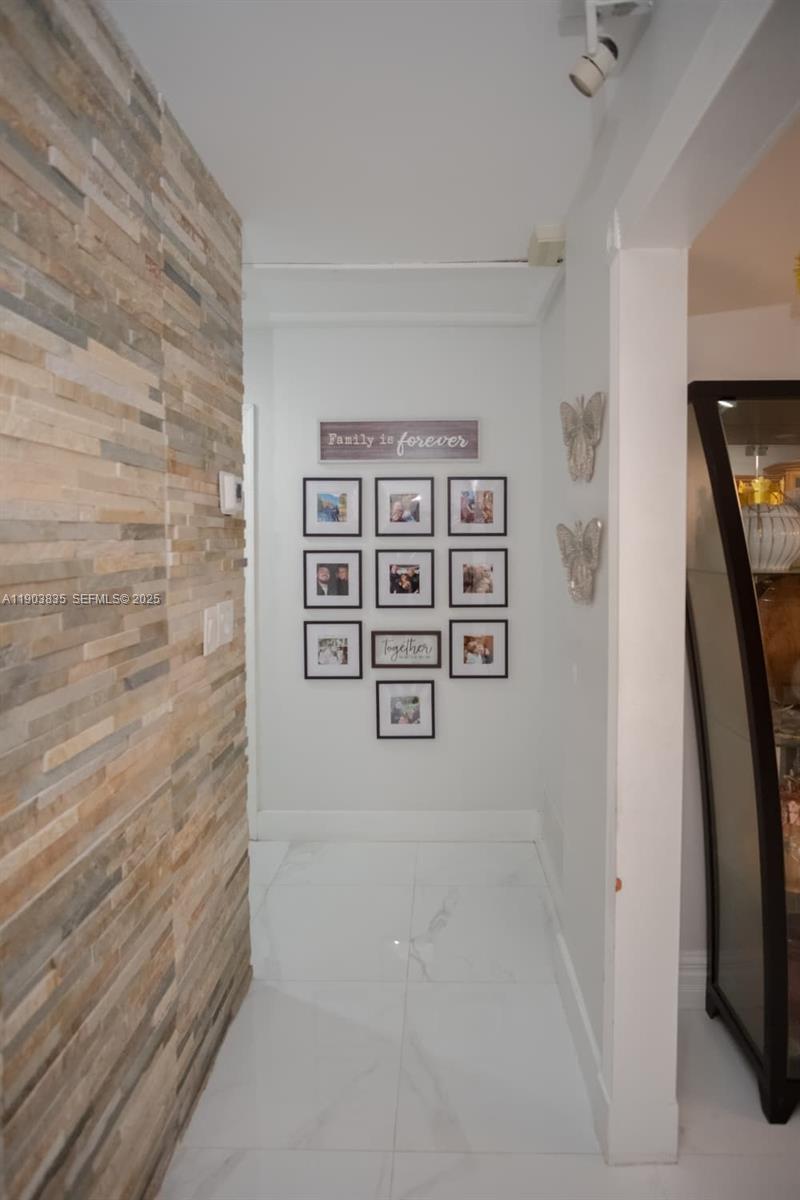 15076 Southwest 63rd Terrace Miami, FL 33193 - Photo 11 of 40 wooden floor with white walls