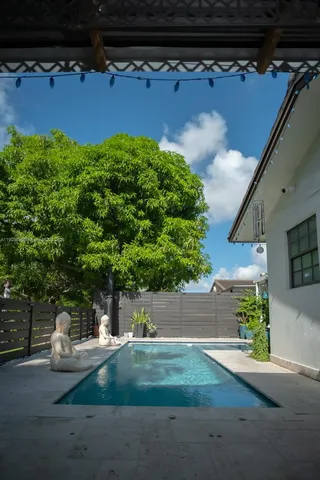 a view of a entryway door and living room
