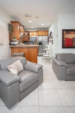 a view of a hallway with a flower pot