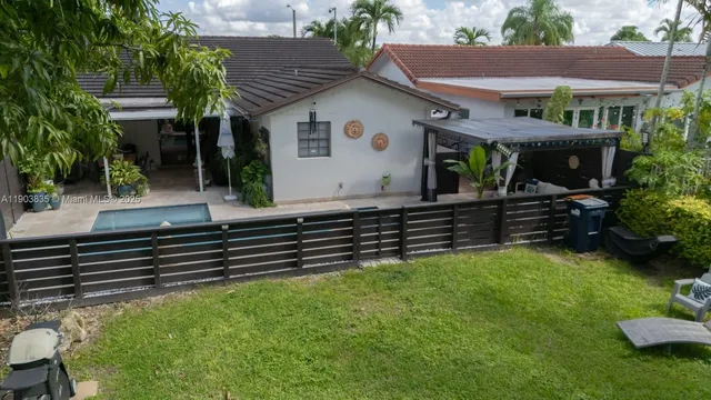 a view of backyard with green space