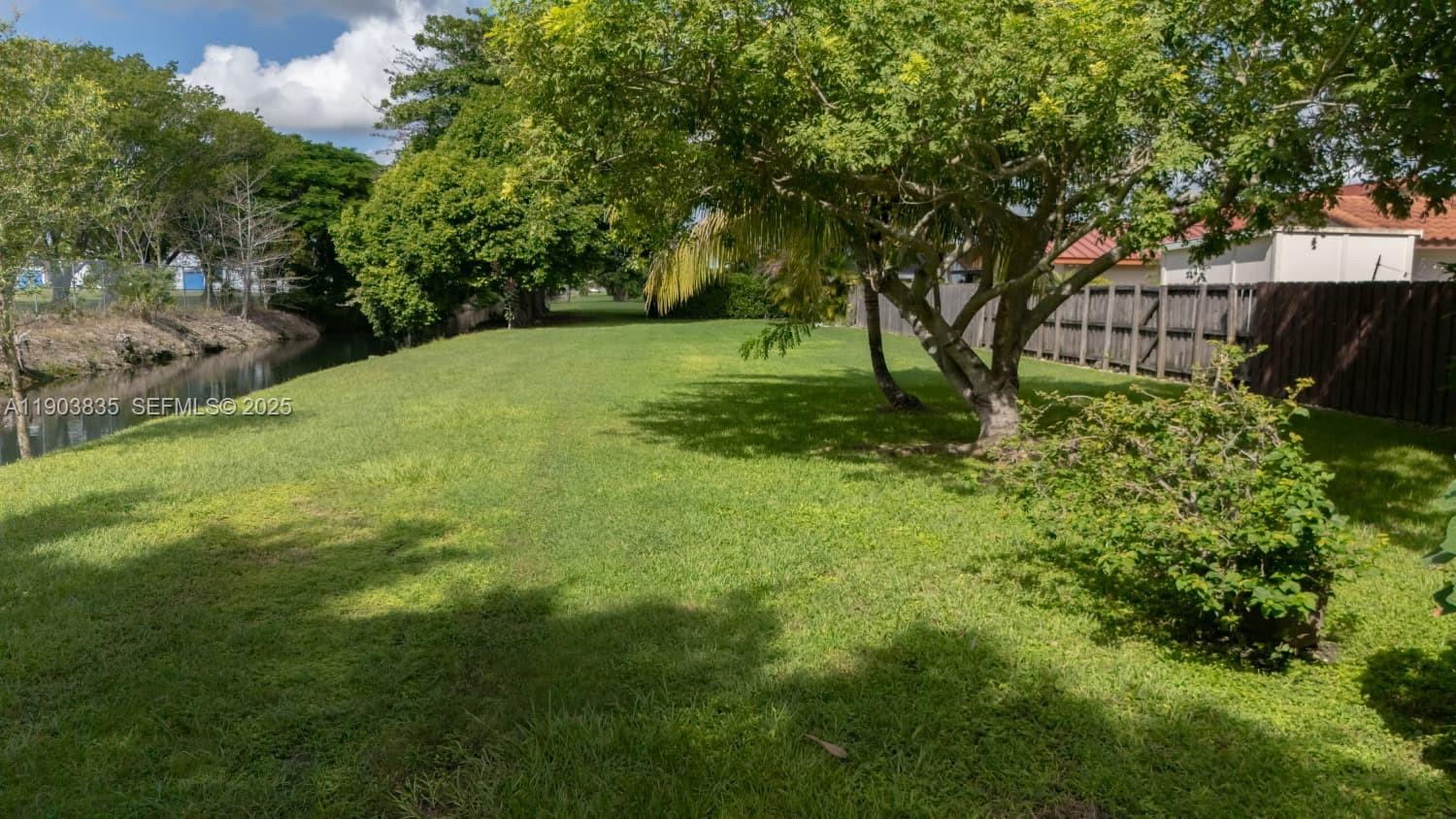 15076 Southwest 63rd Terrace Miami, FL 33193 - Photo 39 of 40 a view of backyard with green space