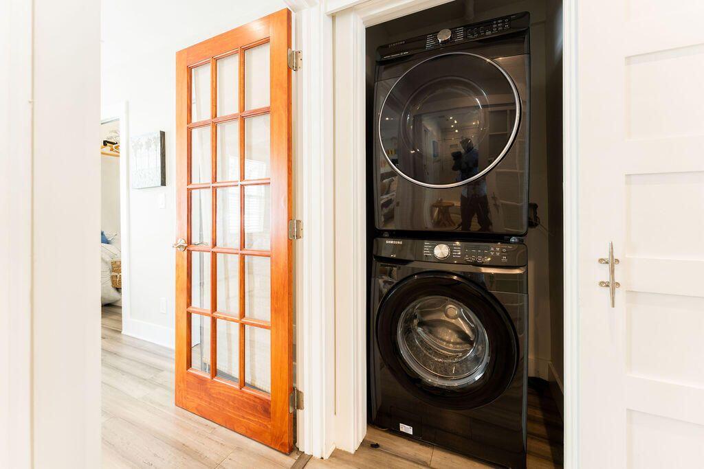 1014 Truman Avenue, Unit 3 Key West, FL 33040 - Photo 4 of 14 a view of a bedroom with washer and dryer