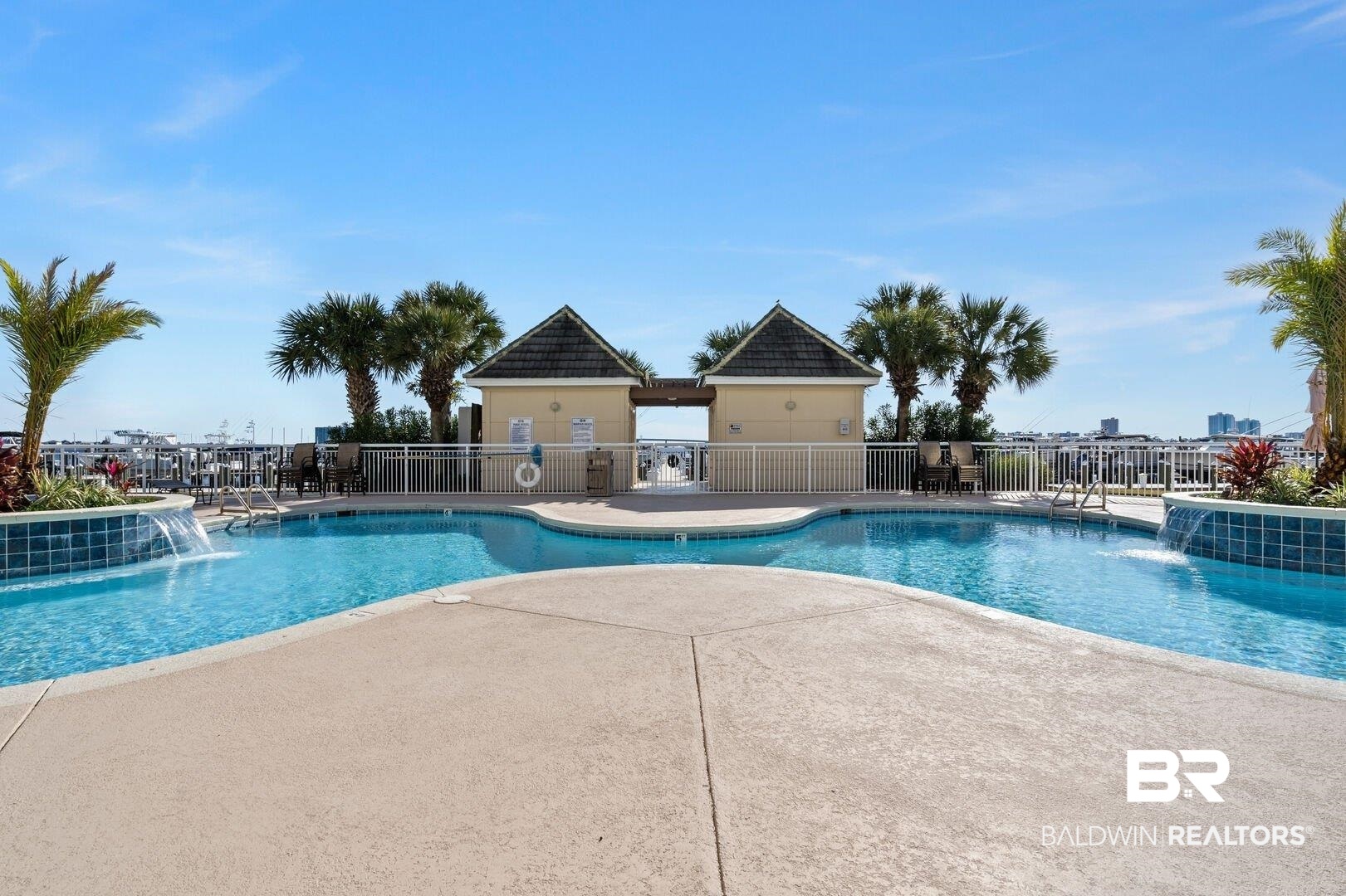 27770 Canal Road, Unit 2502 Orange Beach, AL 36561 - Photo 27 of 55 Community pool featuring a patio area