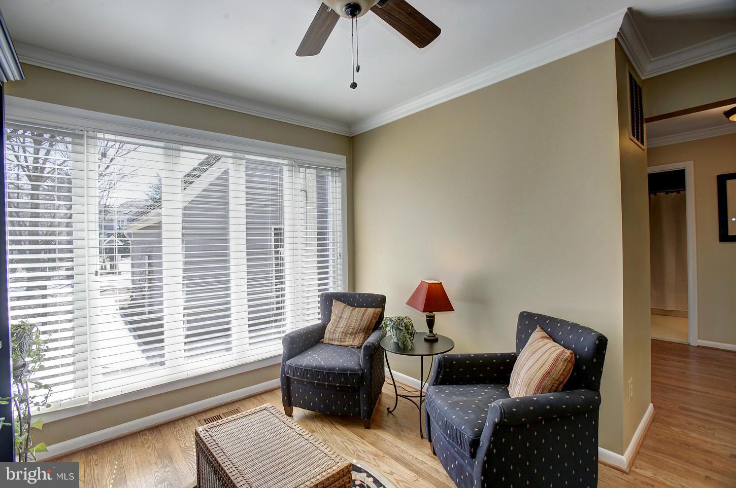 11632 Chapel Cross Way Reston, VA 20194 - Photo 18 of 30 a living room with furniture and a window