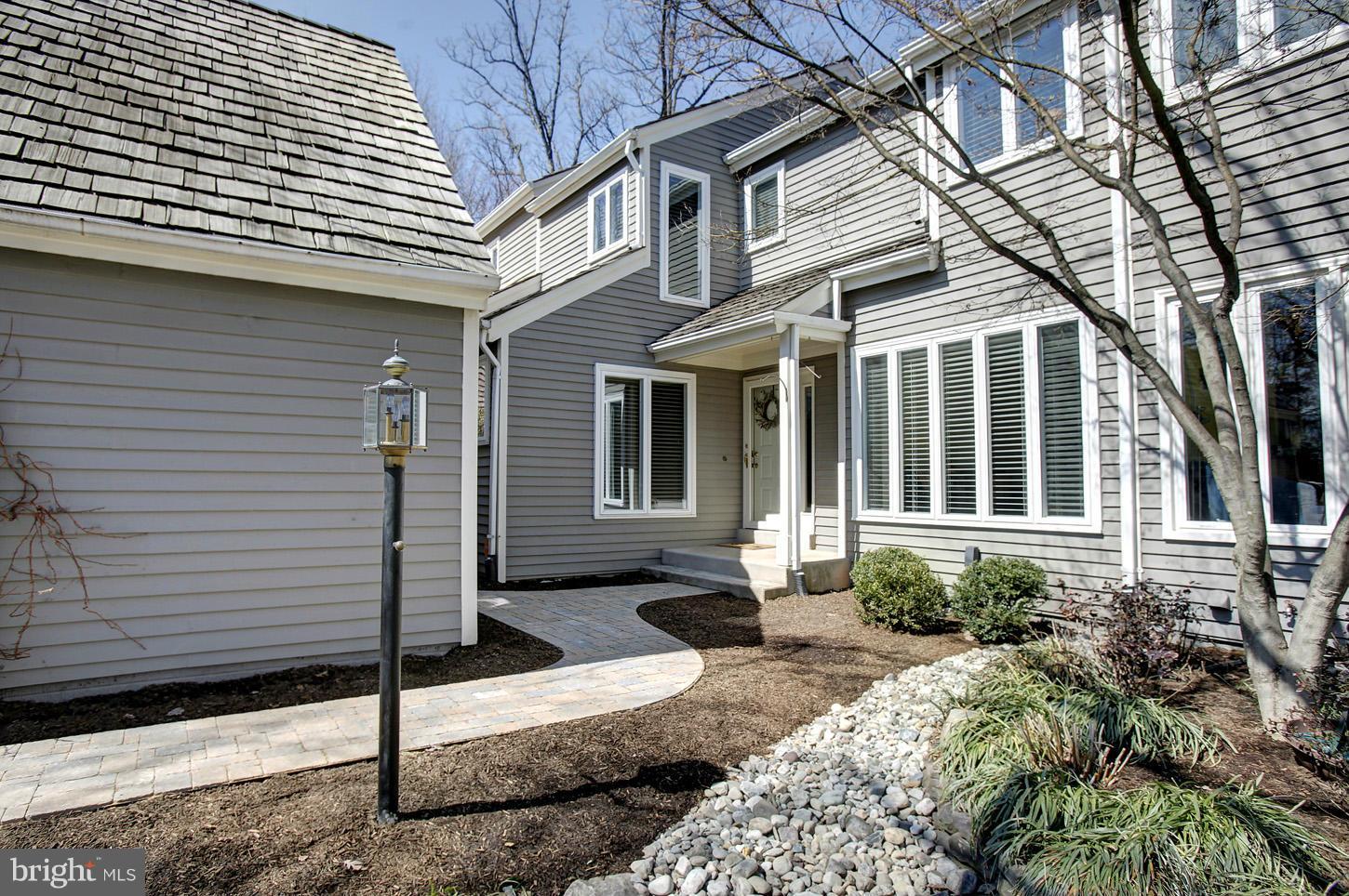 11632 Chapel Cross Way Reston, VA 20194 - Photo 3 of 30 a front view of a house with garden