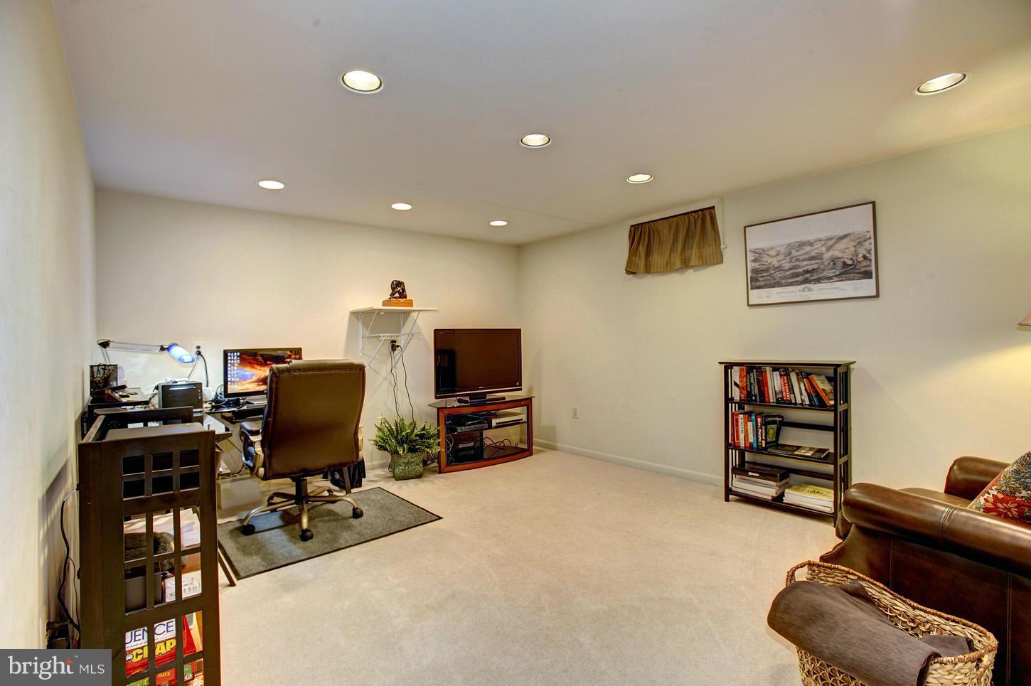 11632 Chapel Cross Way Reston, VA 20194 - Photo 27 of 30 a view of a workspace with furniture