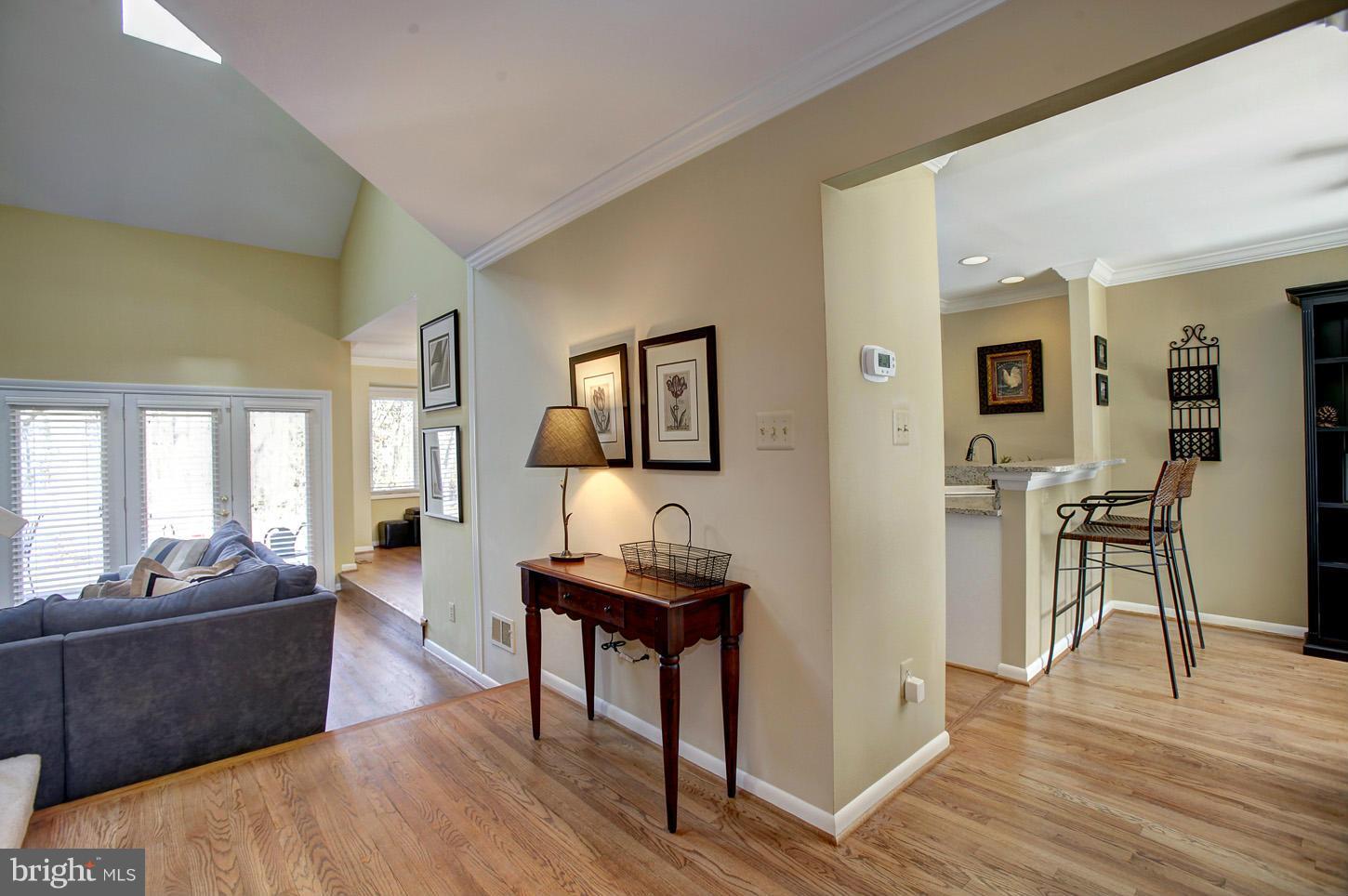 11632 Chapel Cross Way Reston, VA 20194 - Photo 5 of 30 a living room with furniture and a wooden floor