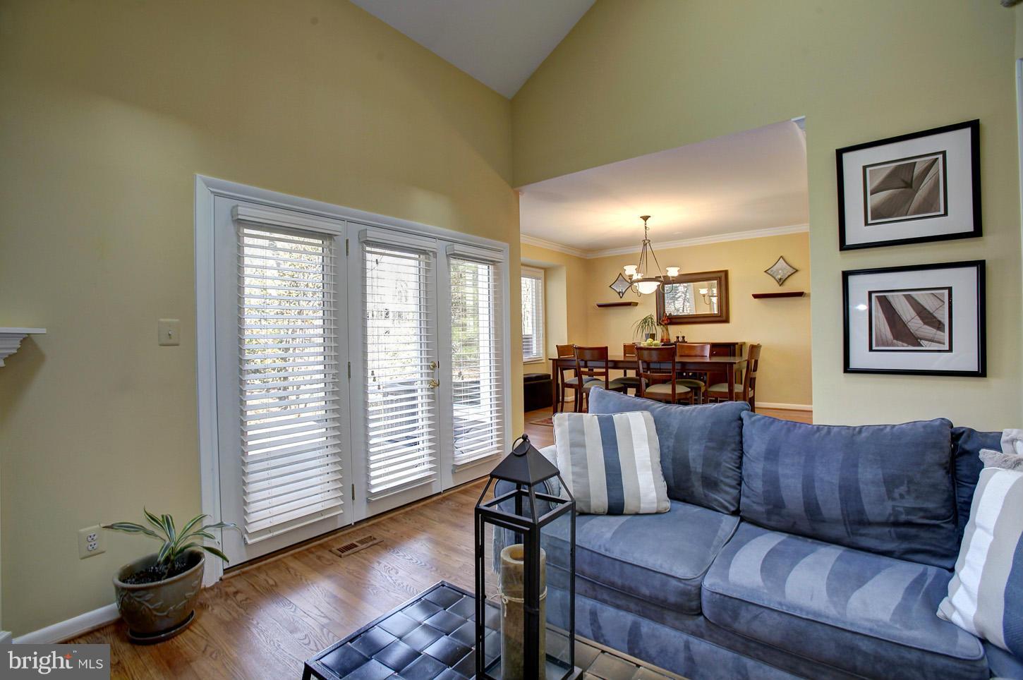 11632 Chapel Cross Way Reston, VA 20194 - Photo 9 of 30 a living room with furniture and wooden floor