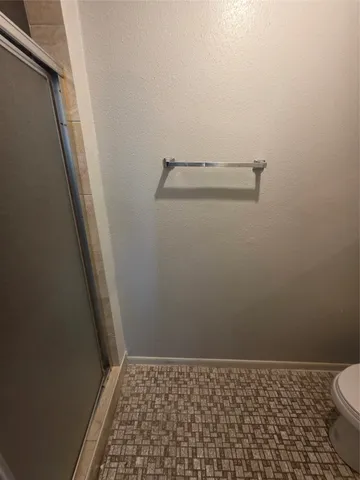 a bathroom with a toilet