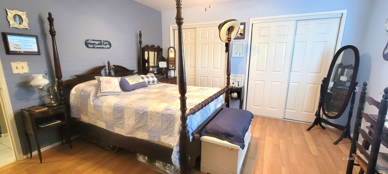 340 East Upjohn Avenue Ridgecrest, CA 93555 - Photo 24 of 31 a bed sitting in a bedroom next to a window