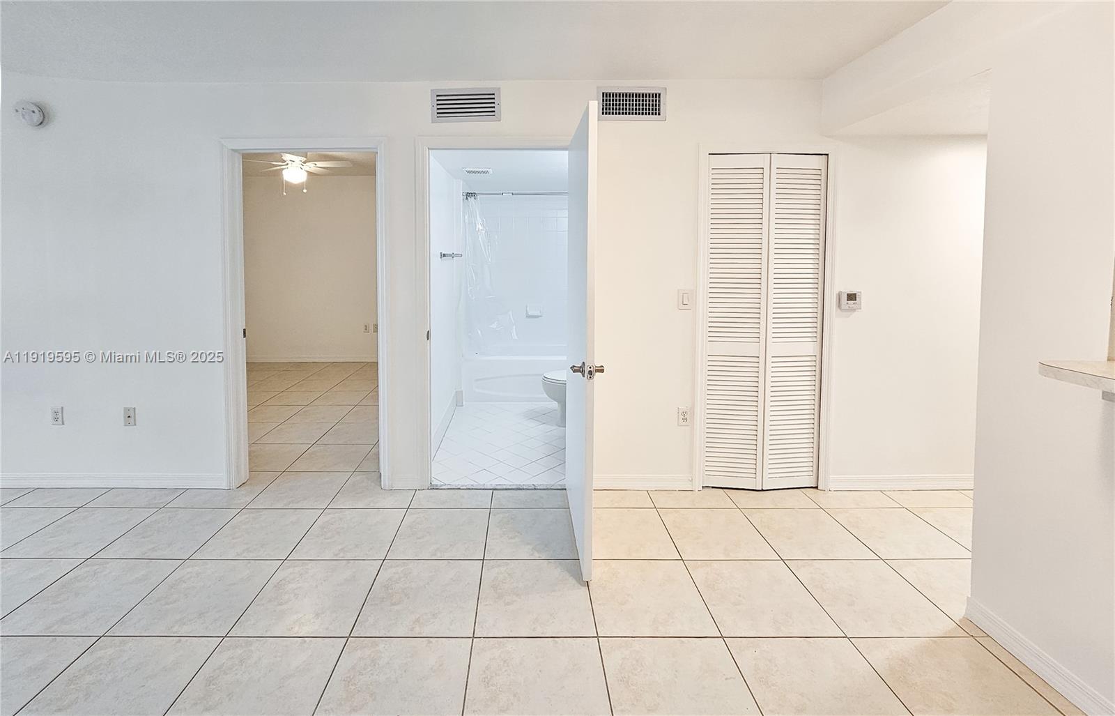 2651 Southeast 12th Road, Unit 105 Homestead, FL 33035 - Photo 11 of 24 a bathroom with a shower
