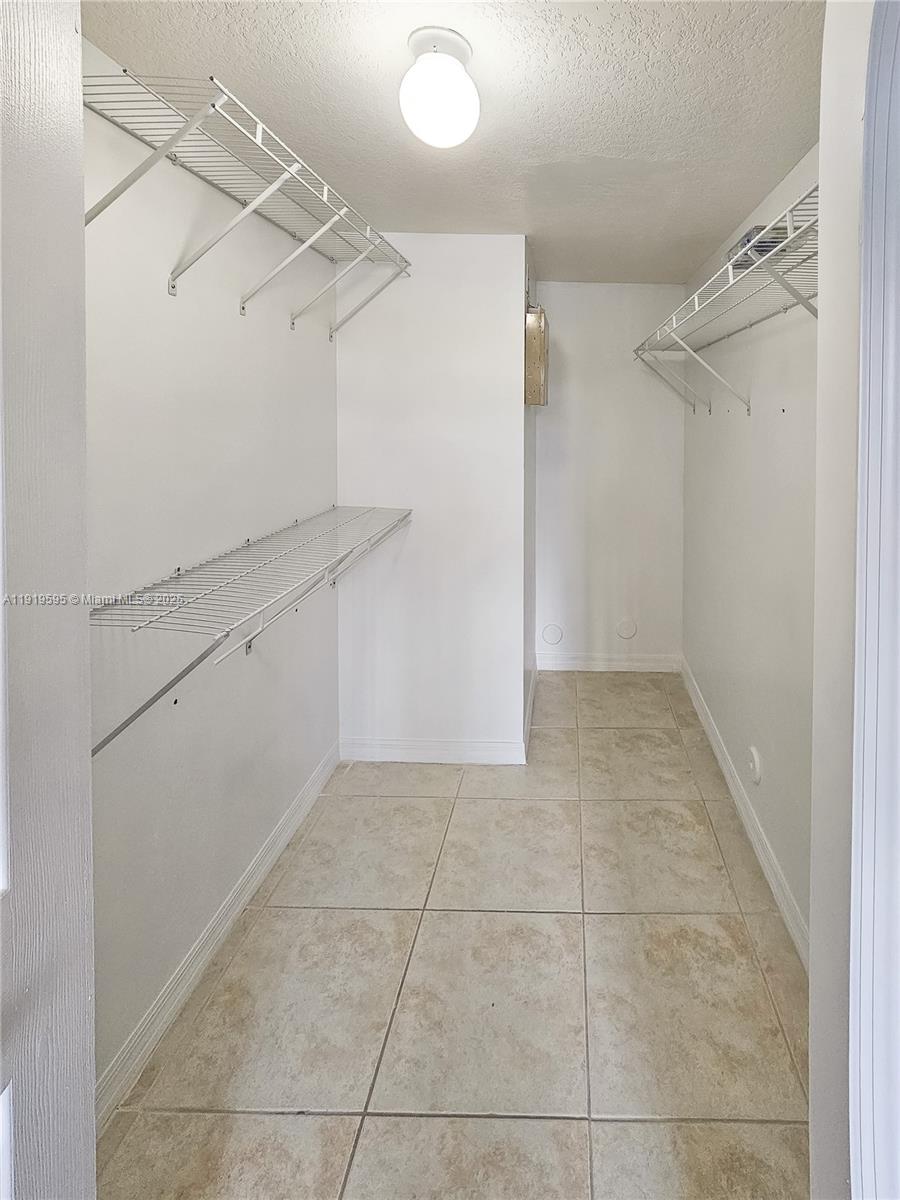 2651 Southeast 12th Road, Unit 105 Homestead, FL 33035 - Photo 14 of 24 a view of a storage and utility room with closet