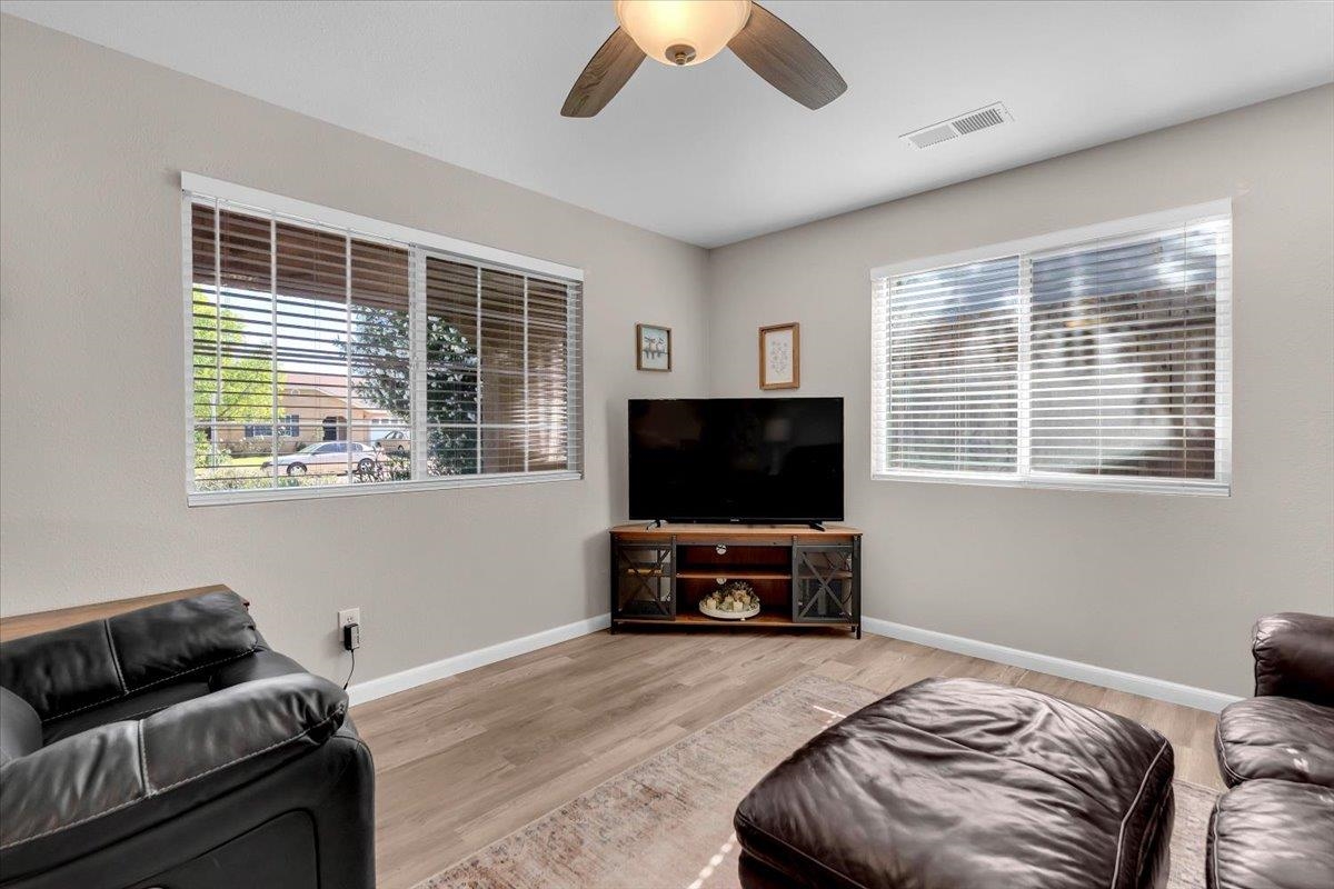 2110 Gentry Way Red Bluff, CA 96080 - Photo 6 of 47 a bedroom with furniture and a flat screen tv