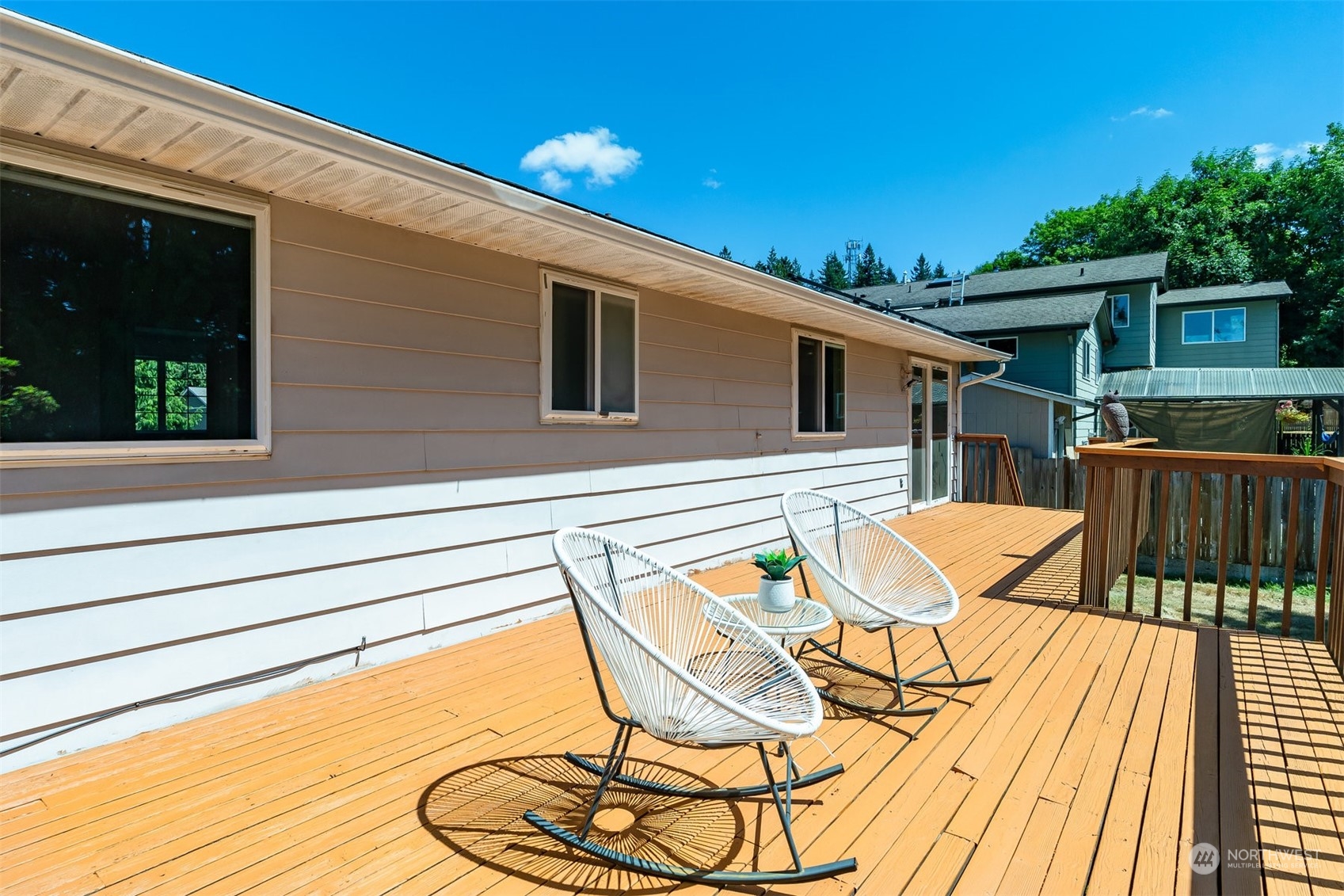 10033 Northeast 204th Street Bothell, WA 98011 - Photo 11 of 26 a view of a house with a patio