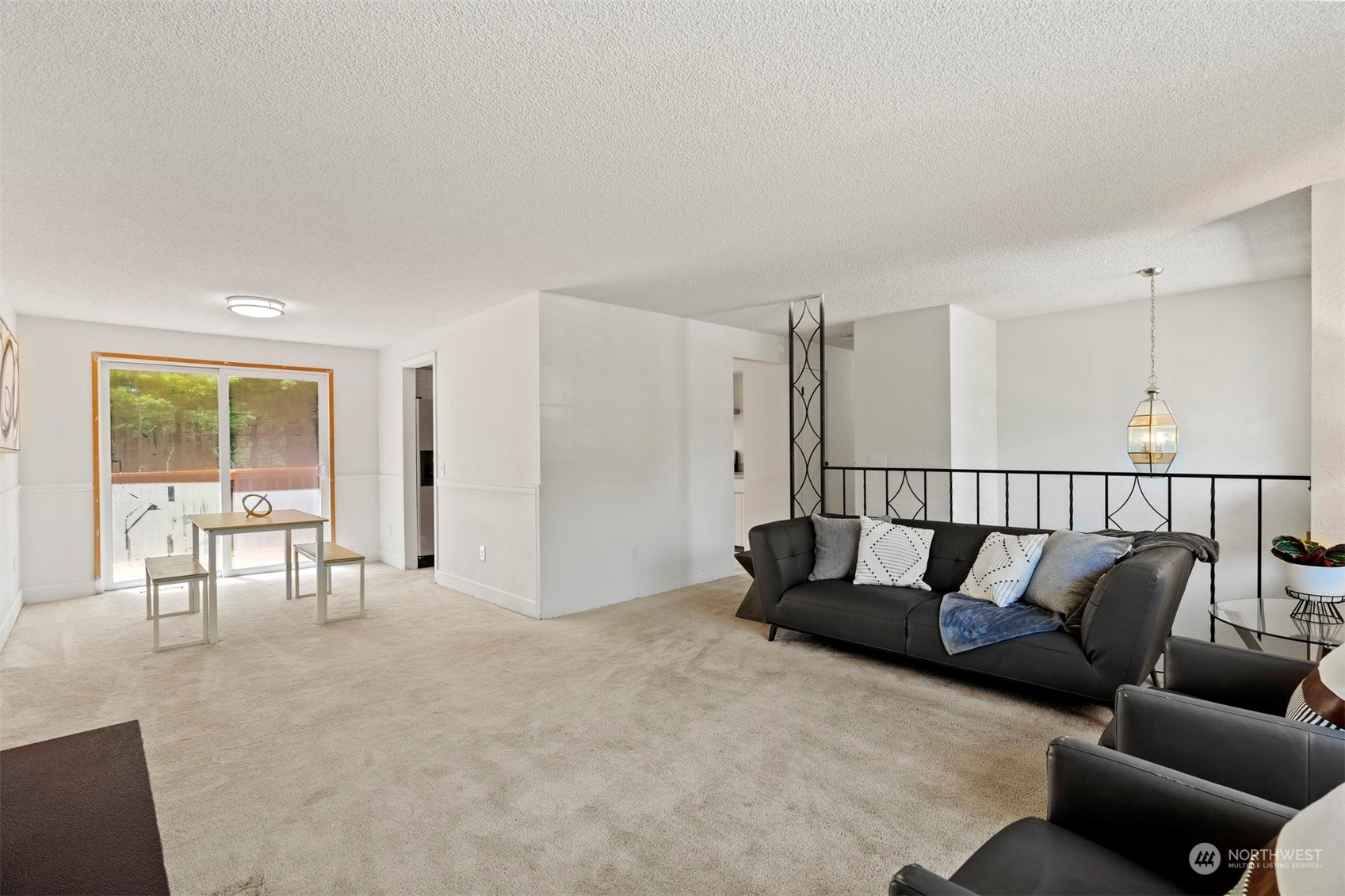 10033 Northeast 204th Street Bothell, WA 98011 - Photo 5 of 26 a living room with furniture and windows