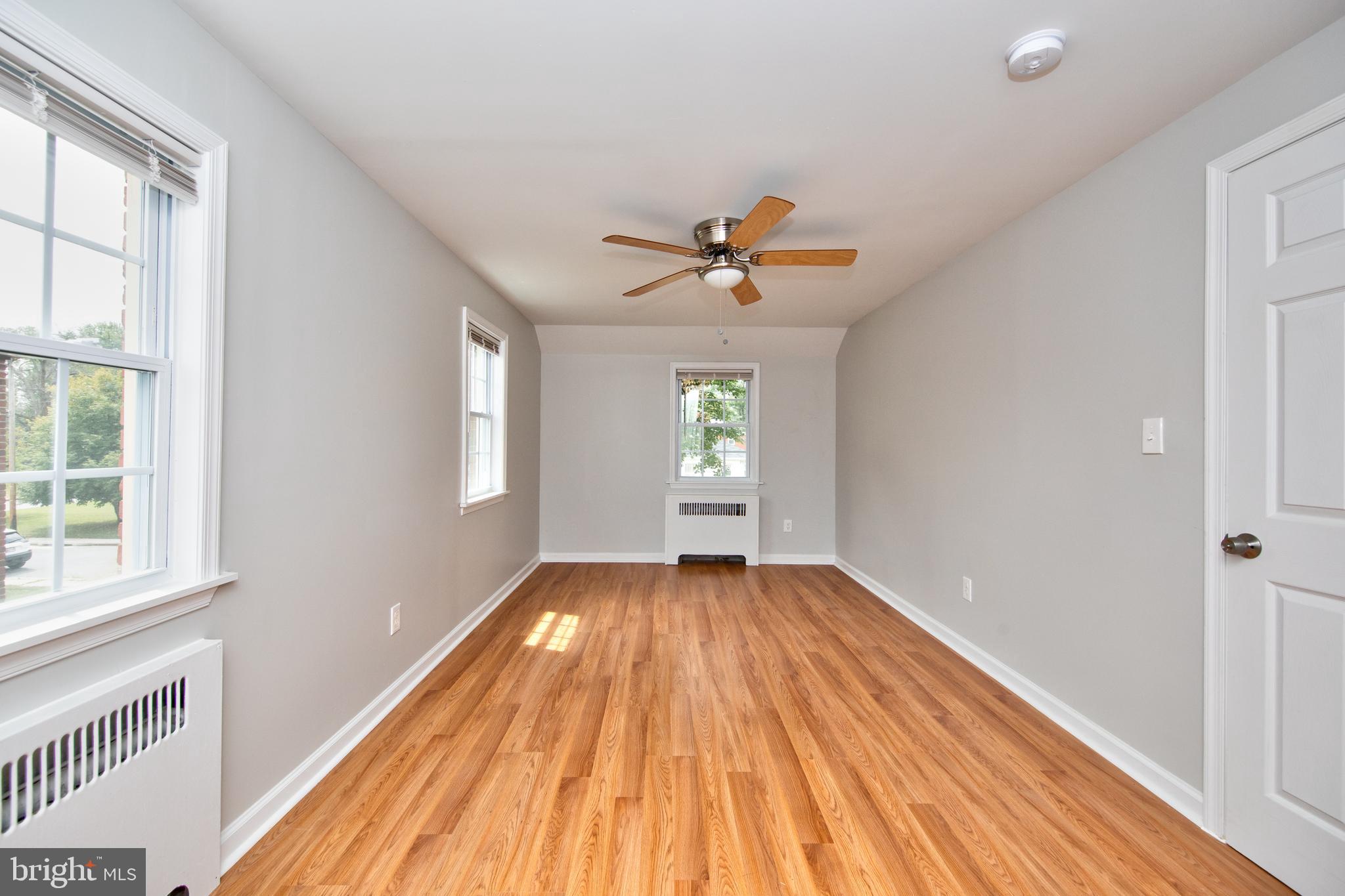 7023 Alden Road Pikesville, MD 21208 - Photo 22 of 29 3rd bedroom w/ laminate flooring