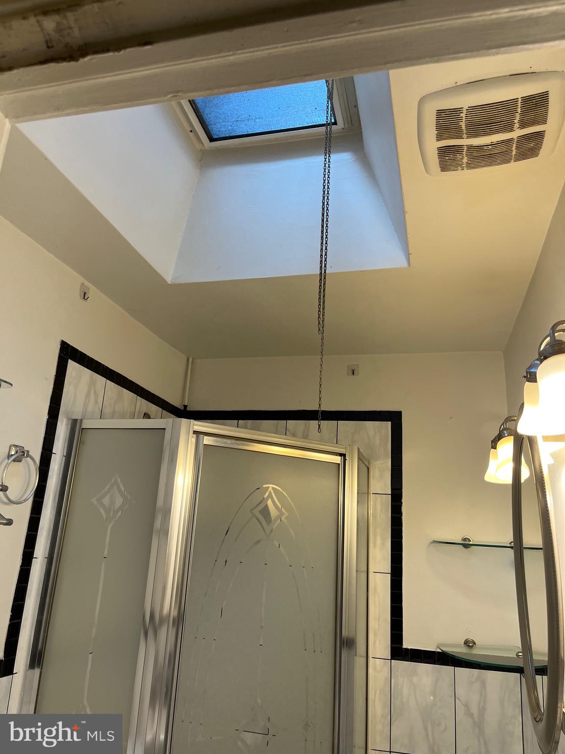 7302 Sherwood Road Philadelphia, PA 19151 - Photo 29 of 51 Bathroom skylight
