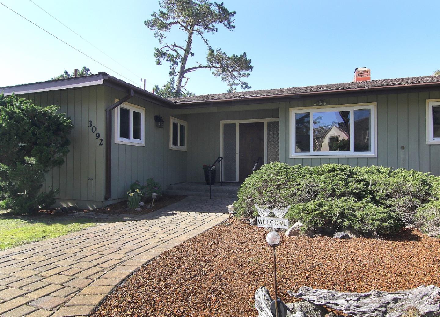 3092 Valdez Road Pebble Beach, CA 93953 - Photo 3 of 17 a front view of a house with a yard