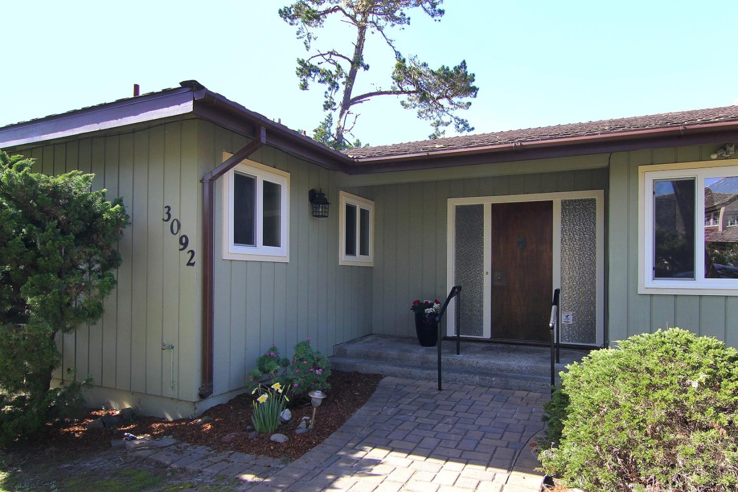 3092 Valdez Road Pebble Beach, CA 93953 - Photo 4 of 17 a front view of a house with a yard