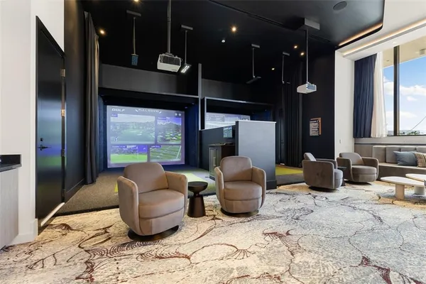 a view of a swimming pool with a lounge chair