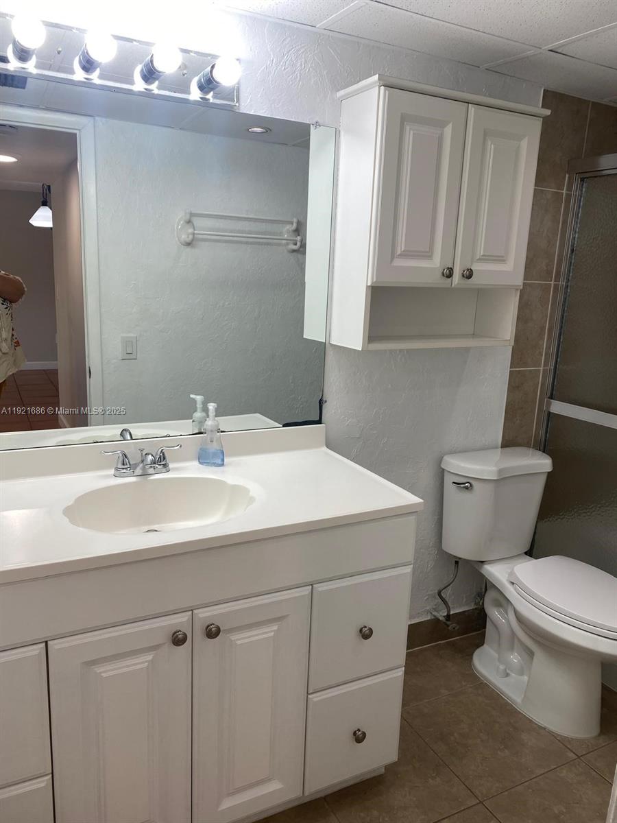 1725 West 60th Street, Unit F128 Hialeah, FL 33012 - Photo 13 of 21 a bathroom with a sink toilet and vanity