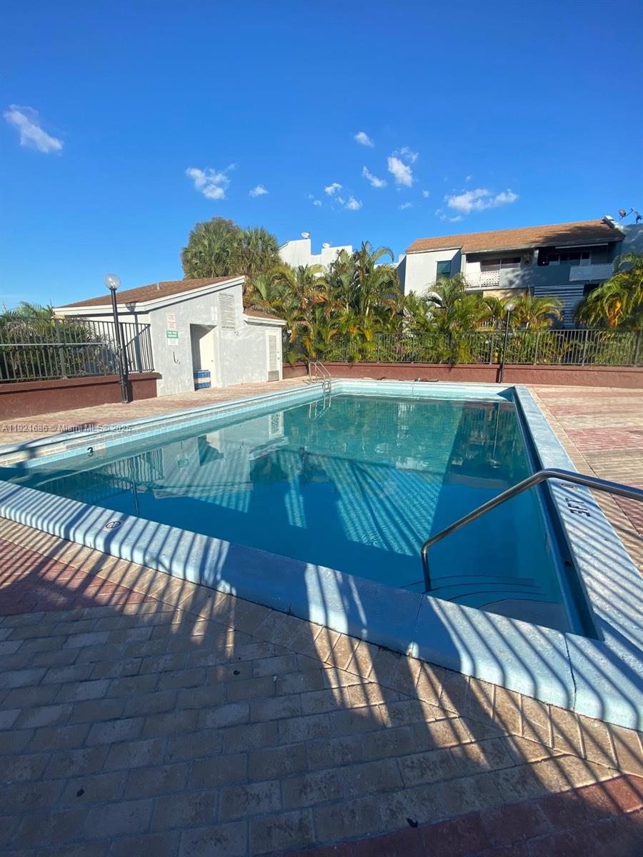 1725 West 60th Street, Unit F128 Hialeah, FL 33012 - Photo 17 of 21 a view of a balcony with an ocean view
