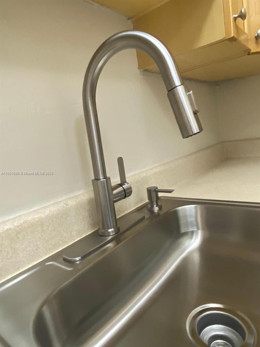 1725 West 60th Street, Unit F128 Hialeah, FL 33012 - Photo 4 of 21 a close view of sink