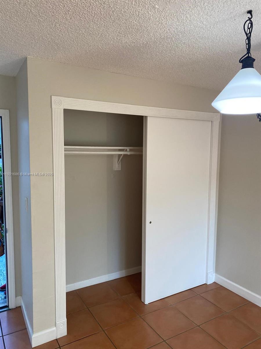 1725 West 60th Street, Unit F128 Hialeah, FL 33012 - Photo 9 of 21 a view of an empty room