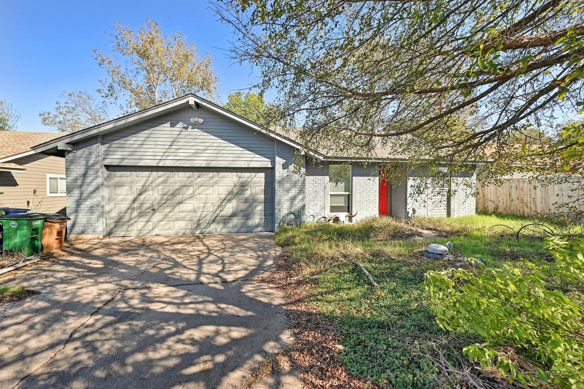 1208 Milford Way Austin, TX 78745 - Photo 3 of 22 a view of a house with a yard
