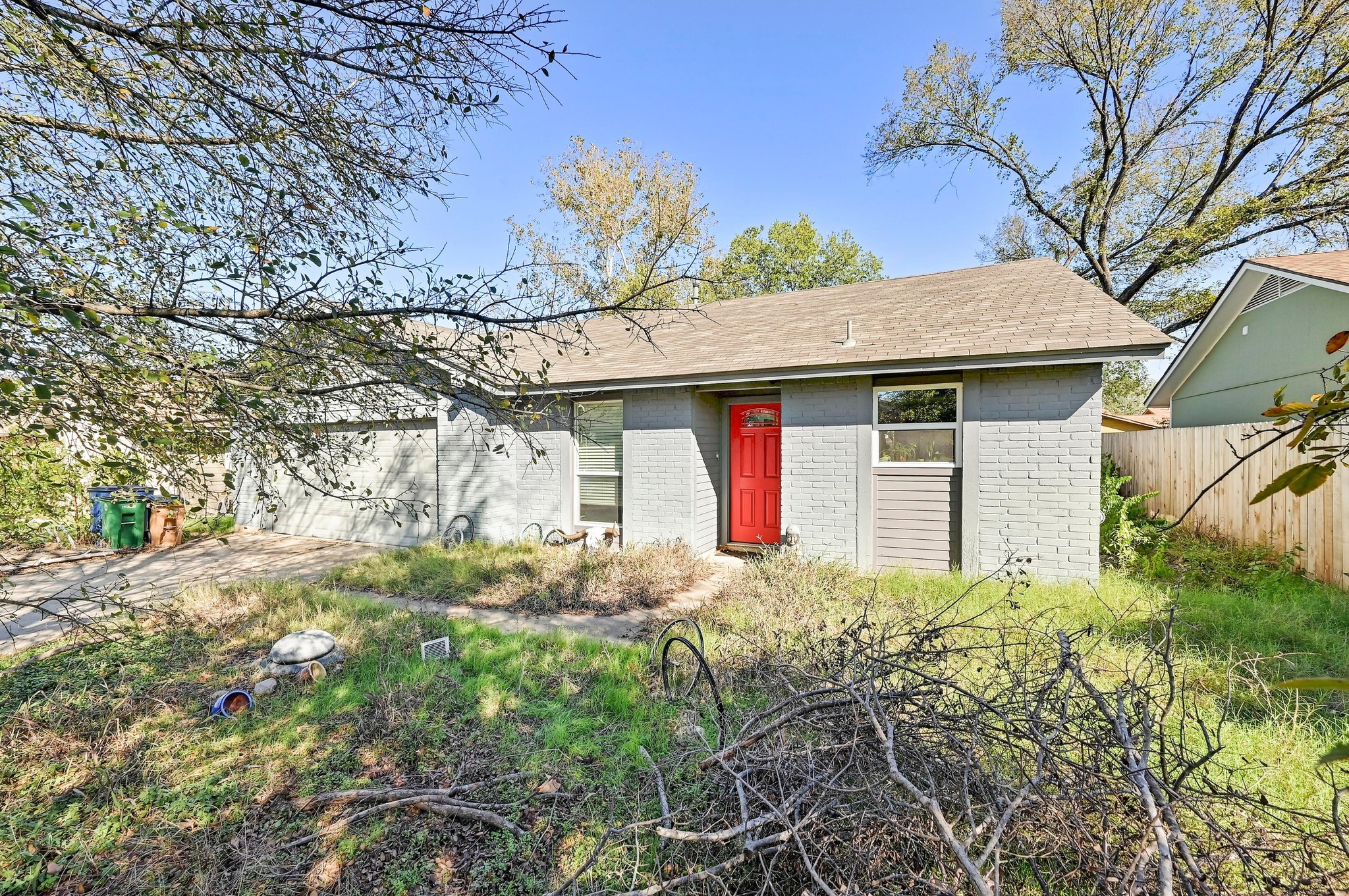 1208 Milford Way Austin, TX 78745 - Photo 5 of 22 a front view of a house with garden