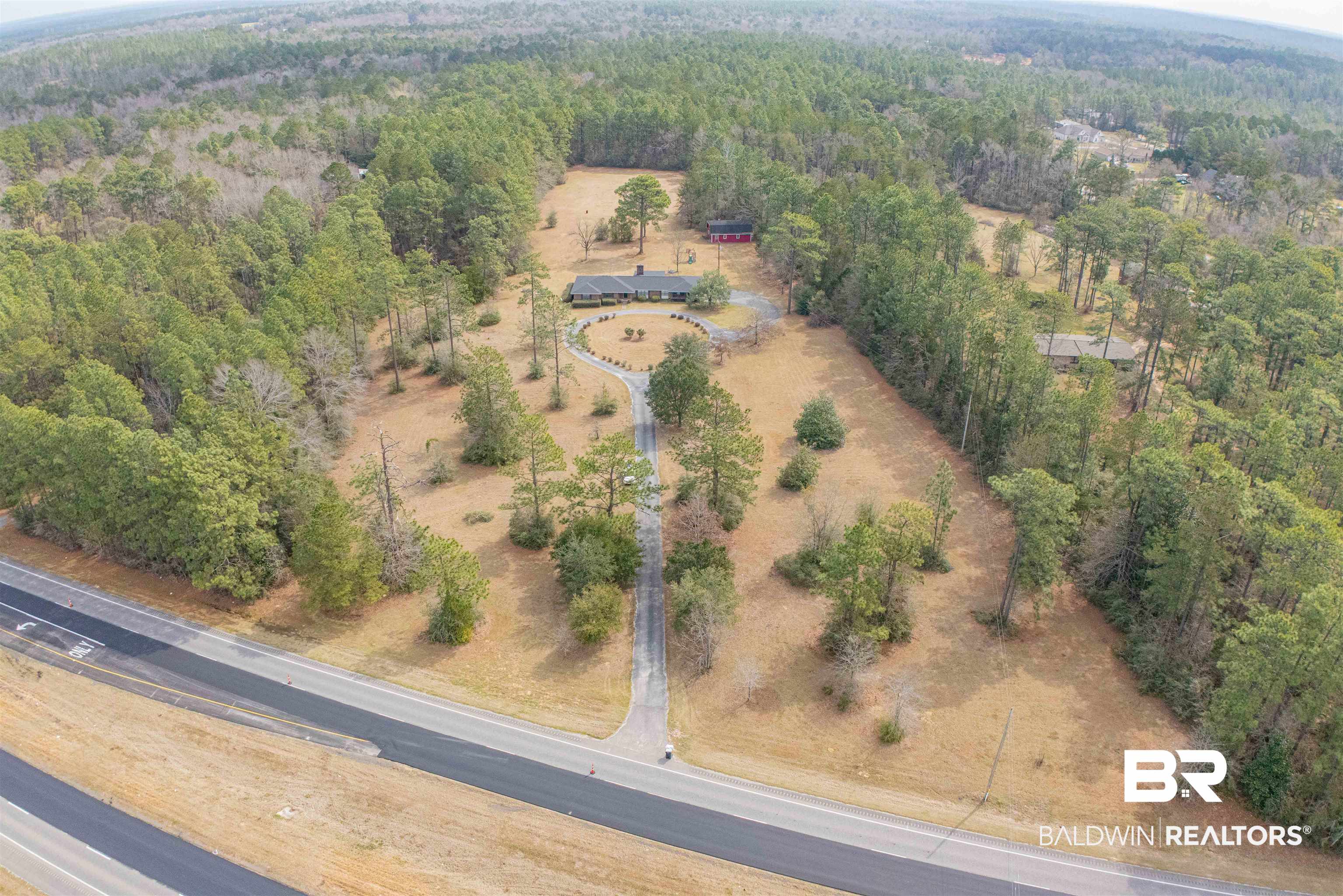 47580 Rabun Road Bay Minette, AL 36507 - Photo 5 of 55 Drone / aerial view featuring a wooded view
