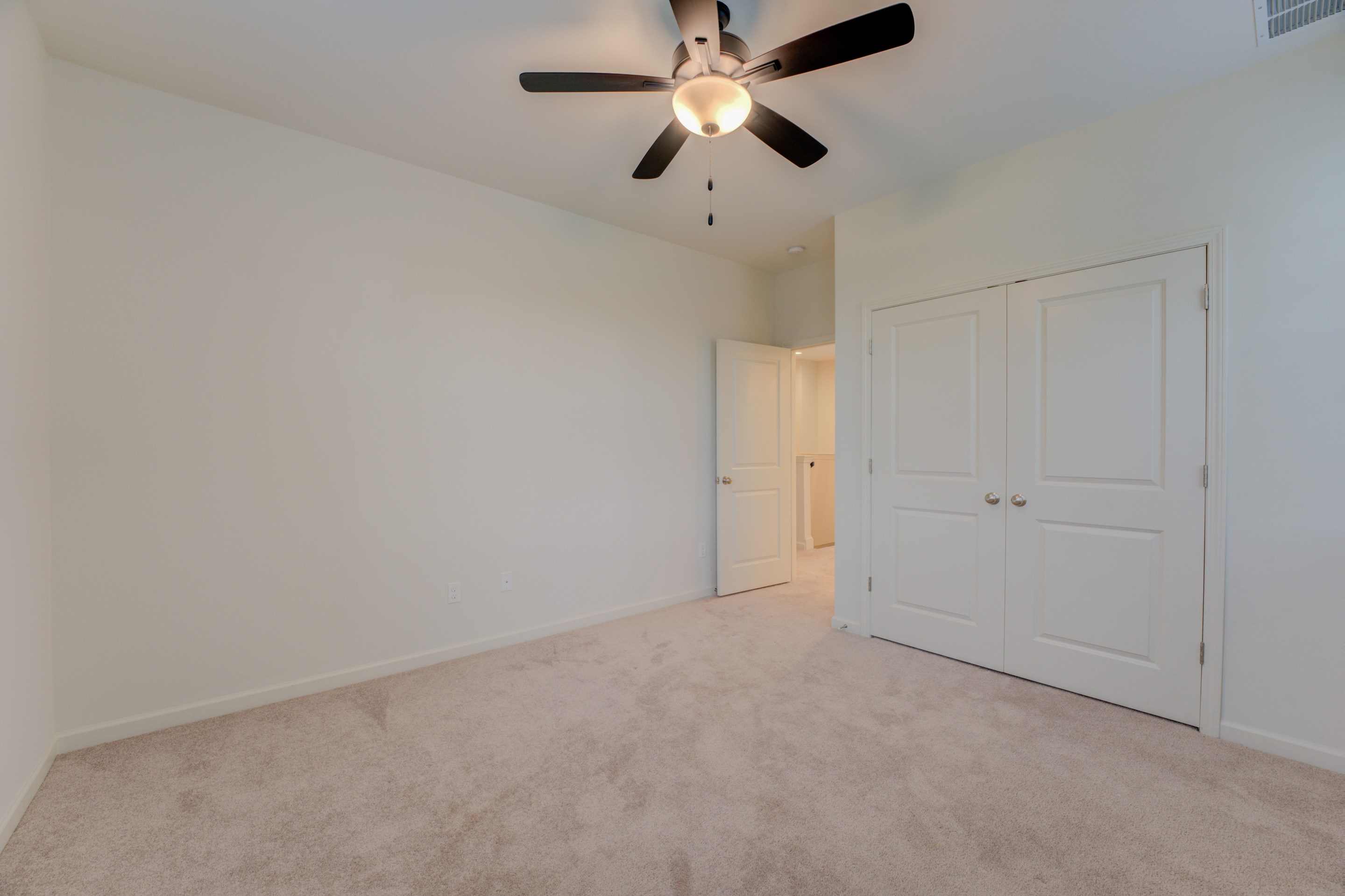 909 Ufton Alley Collierville, TN 38017 - Photo 21 of 29 en empty room with ceiling fan and window