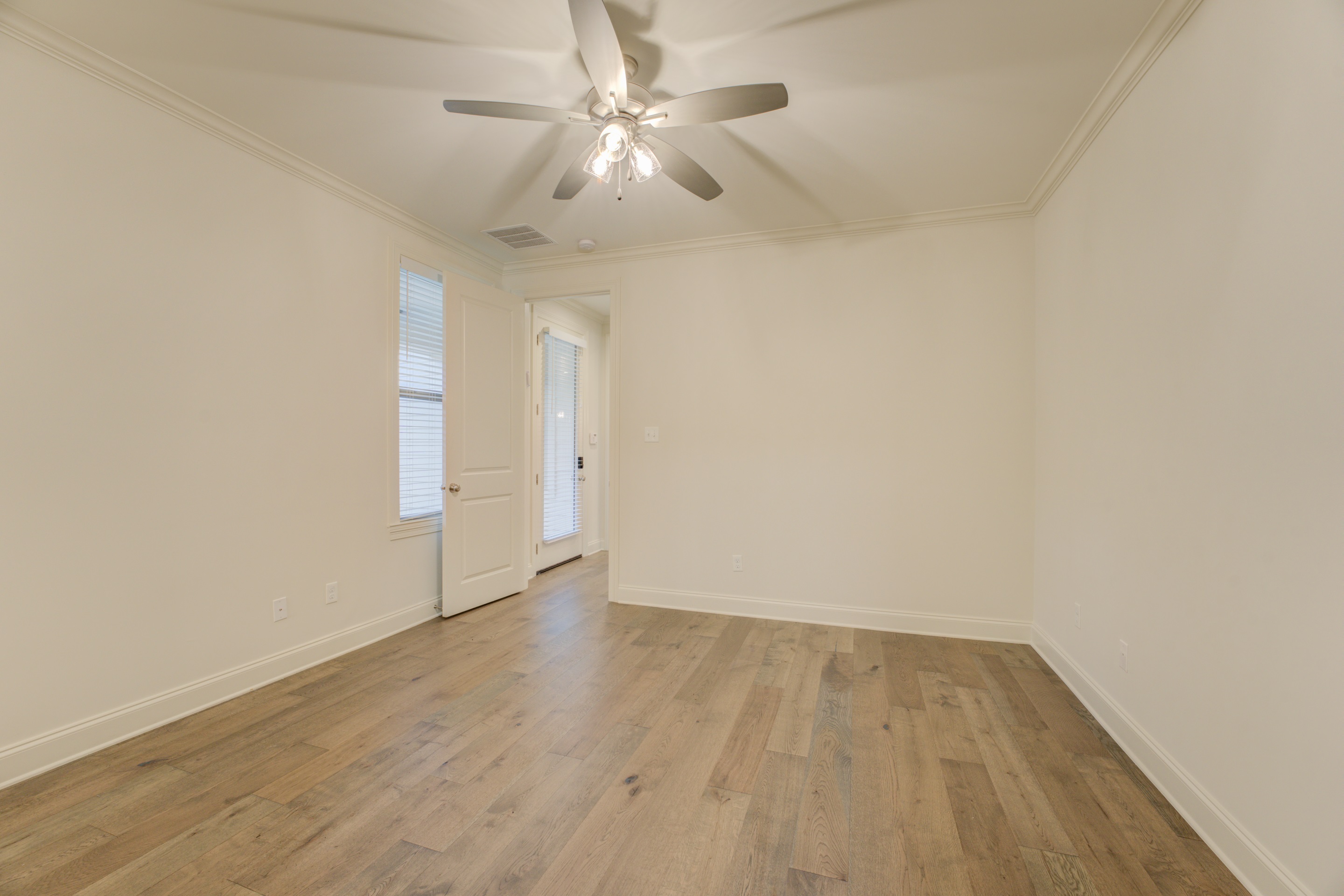 909 Ufton Alley Collierville, TN 38017 - Photo 23 of 29 wooden floor in an empty room