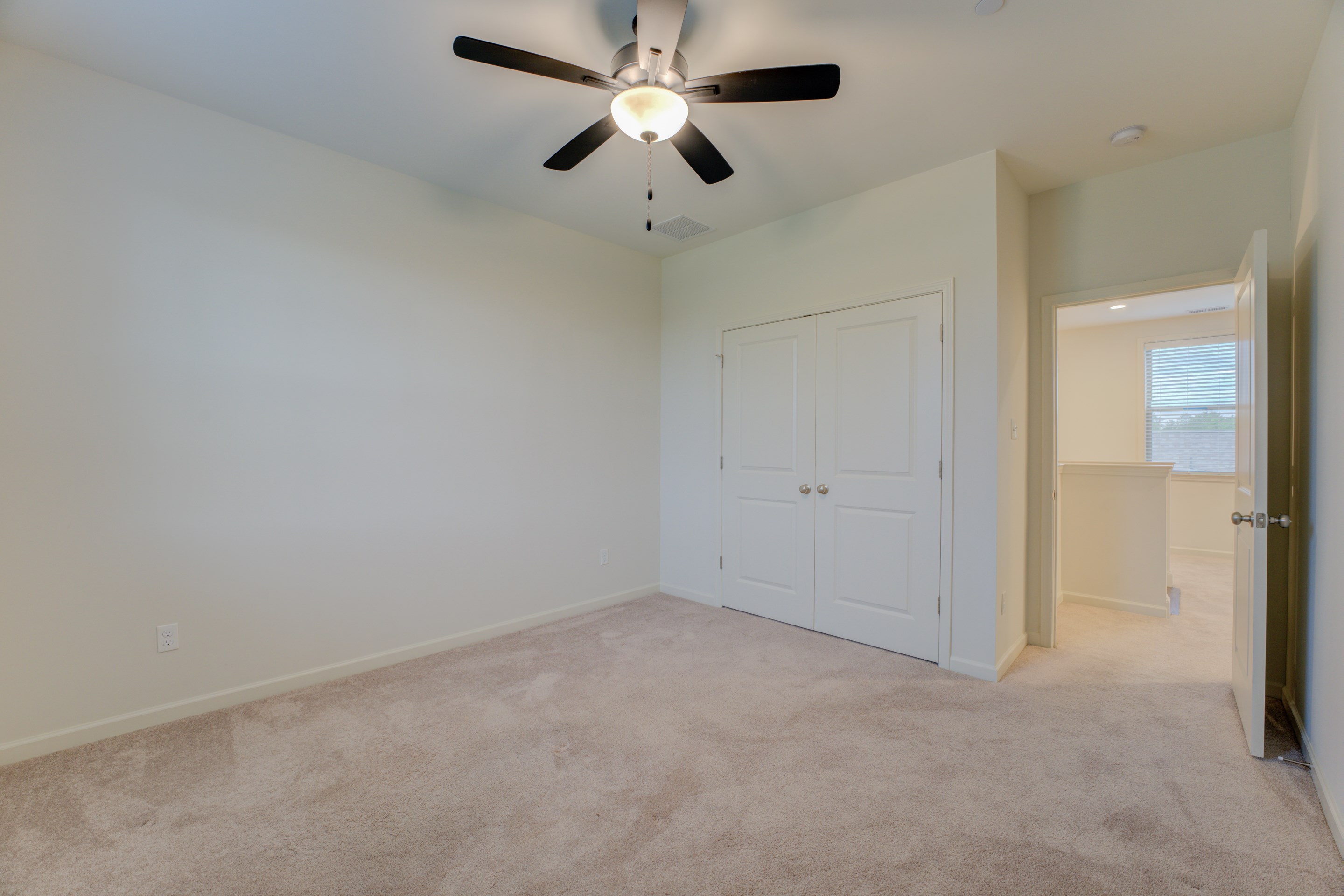 909 Ufton Alley Collierville, TN 38017 - Photo 24 of 29 an empty room with a ceiling fan and a fan