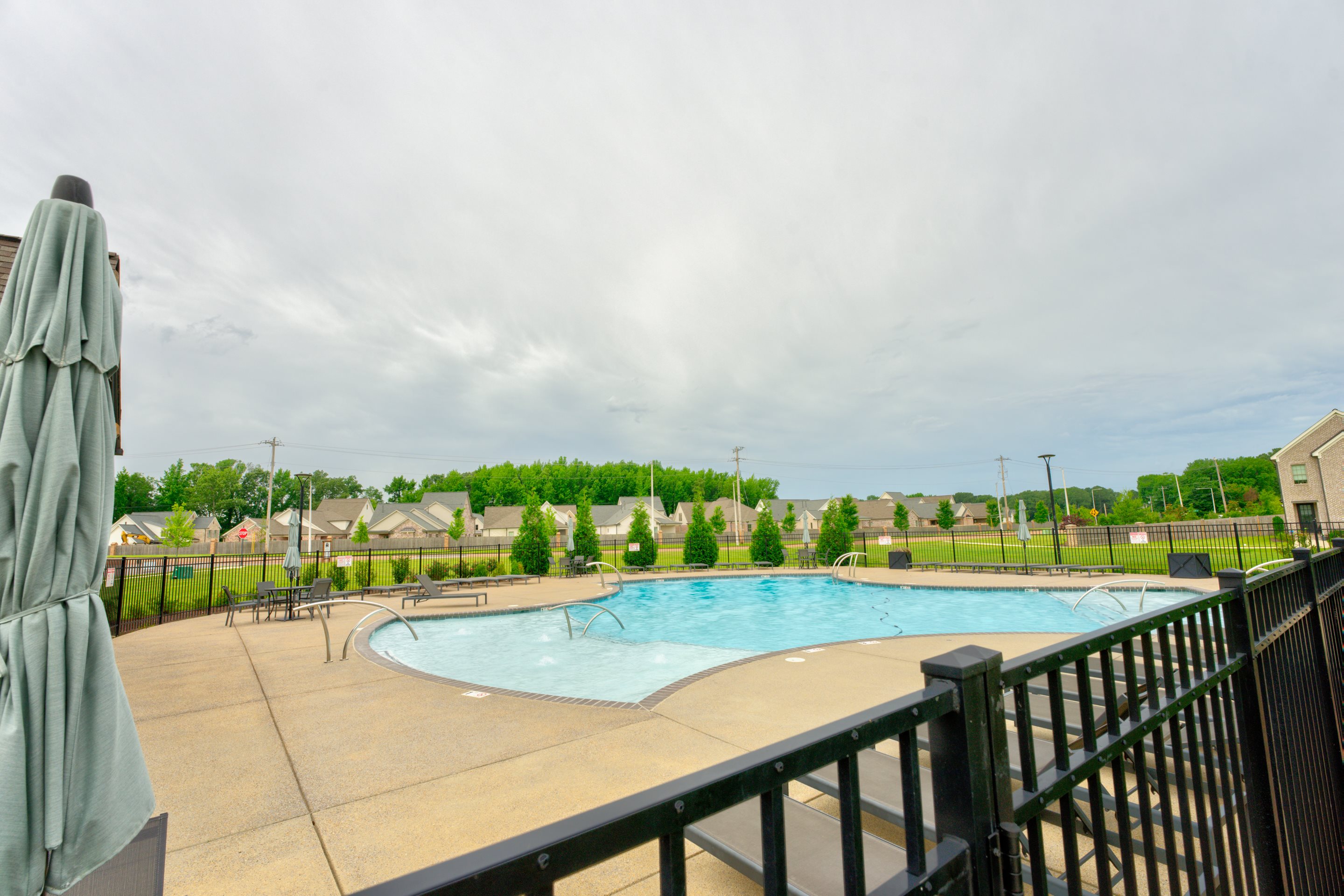 909 Ufton Alley Collierville, TN 38017 - Photo 27 of 29 a view of a swimming pool from a balcony