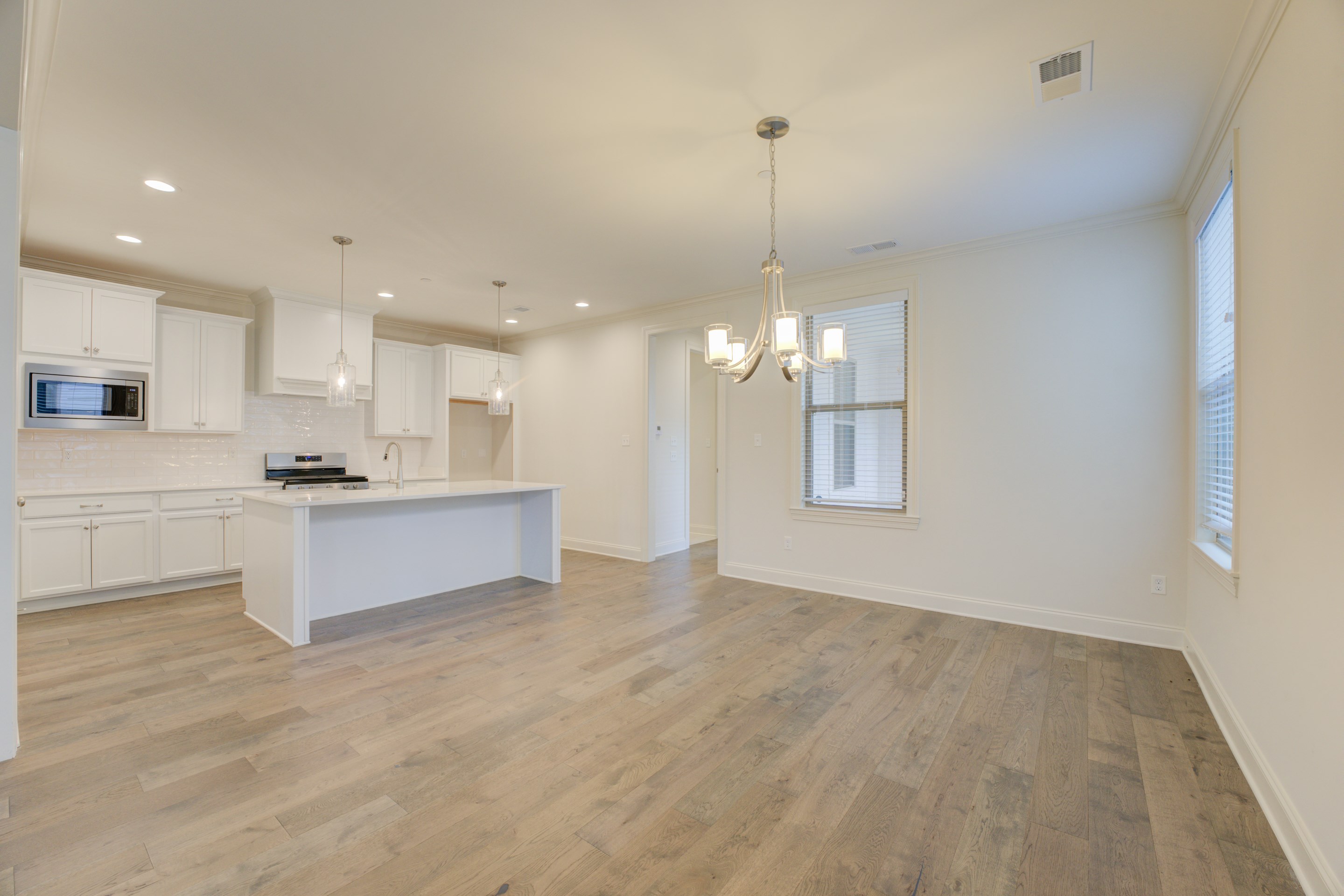 909 Ufton Alley Collierville, TN 38017 - Photo 7 of 29 a view of an empty room and kitchen view