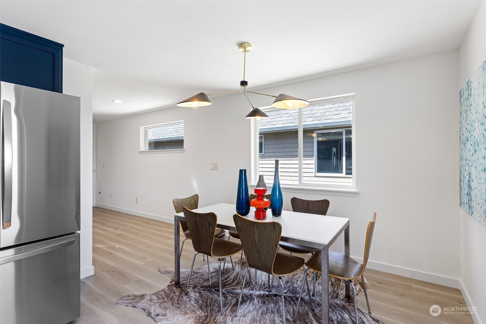 1424 18th Avenue Seattle, WA 98122 - Photo 8 of 29 a view of a dining room with furniture window and wooden floor